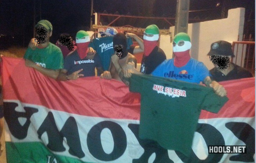 Sevilla hooligans with trophies taken from Slask Wroclaw fans, 22 August 2013.