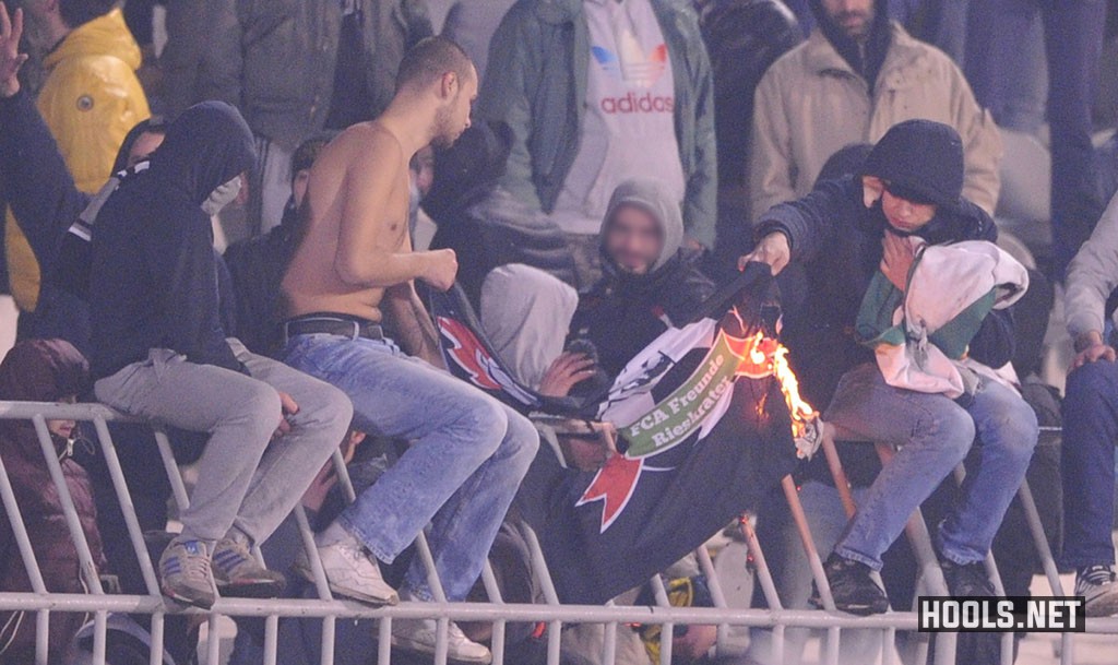 Partizan hools burn their trophies.