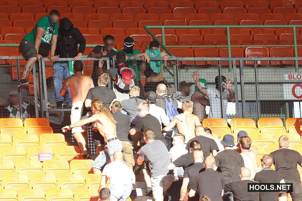 Austria Vienna and Rapid Vienna fans clash inside the Ernst Happel Stadium after the final whistle.