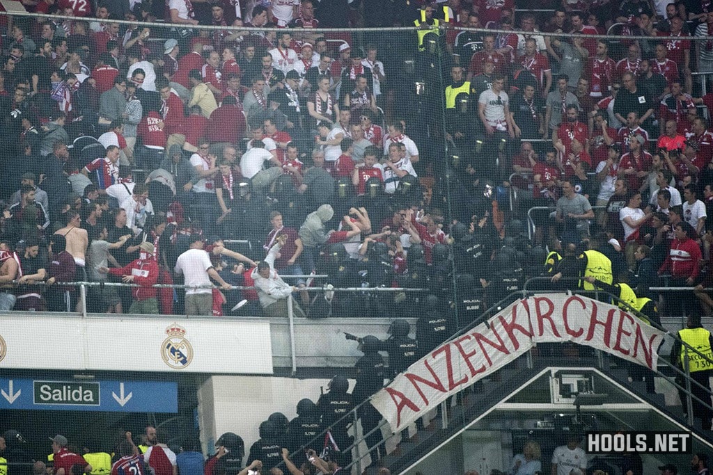 Spanish police attack Bayern Munich fans during Real Madrid match ...
