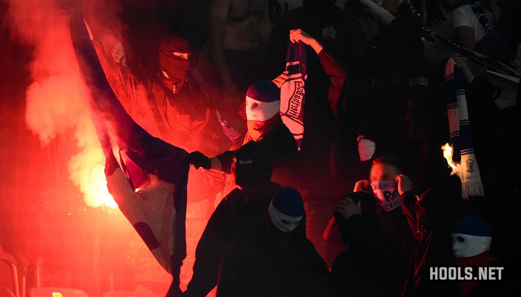 Hansa Rostock hooligans set fire to a Hertha Berlin banner during their German Cup clash