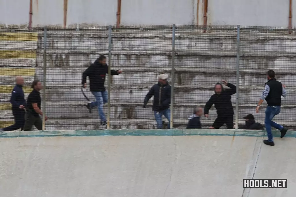 Varese and Como fans clash in the stands.