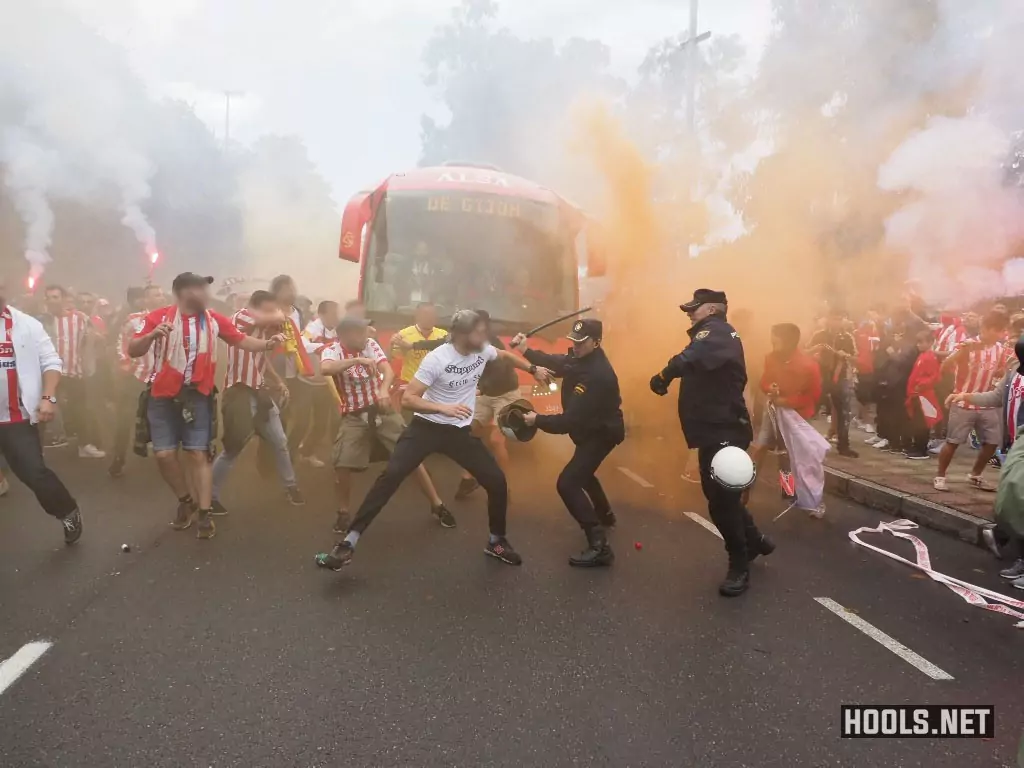 Sporting Gijon fans clash with police before their game against Real Oviedo