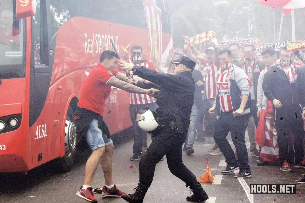 Sporting Gijon fans clash with police before their game against Real Oviedo