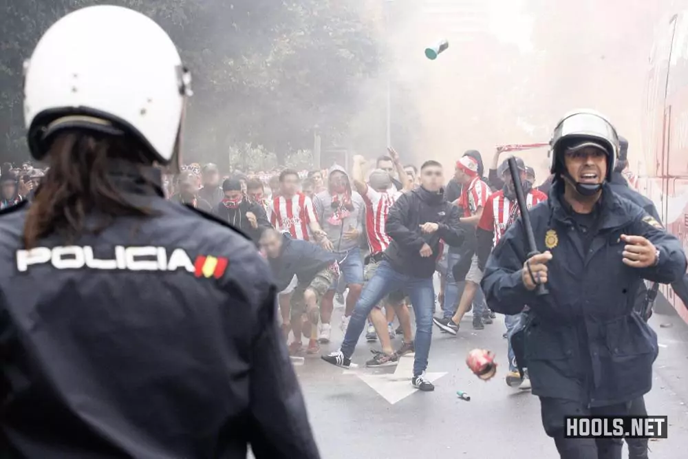 Sporting Gijon fans clash with police before their game against Real Oviedo