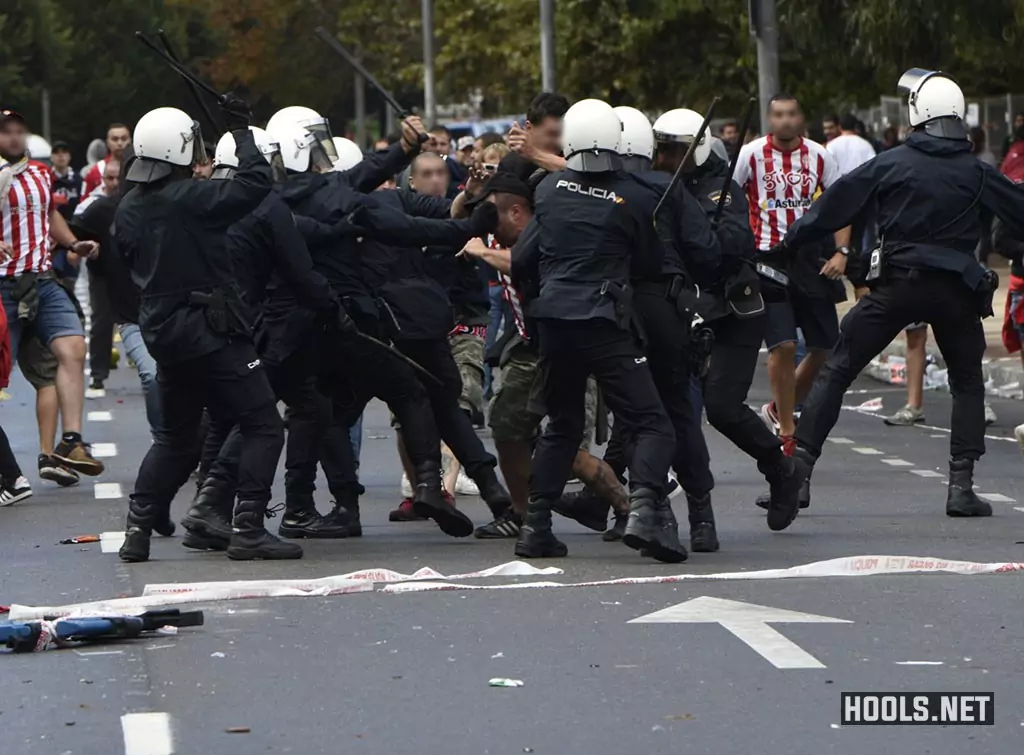 Sporting Gijon fans clash with police before their game against Real Oviedo