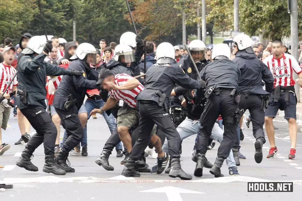 Sporting Gijon fans clash with police before their game against Real Oviedo