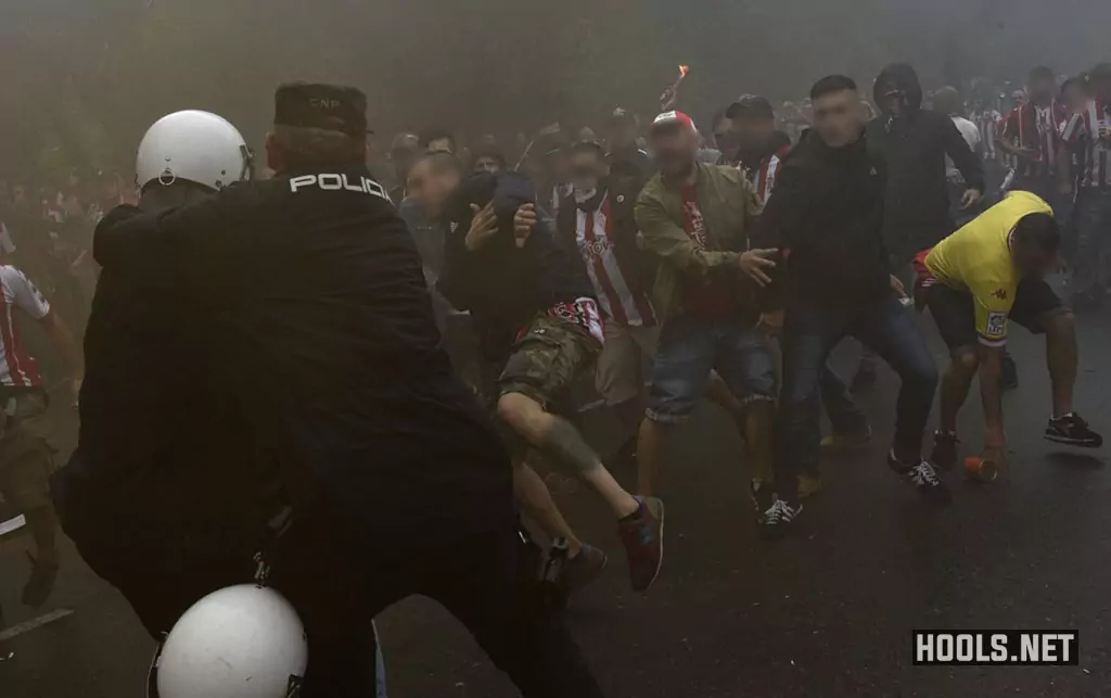 Sporting Gijon fans clash with police before their game against Real Oviedo