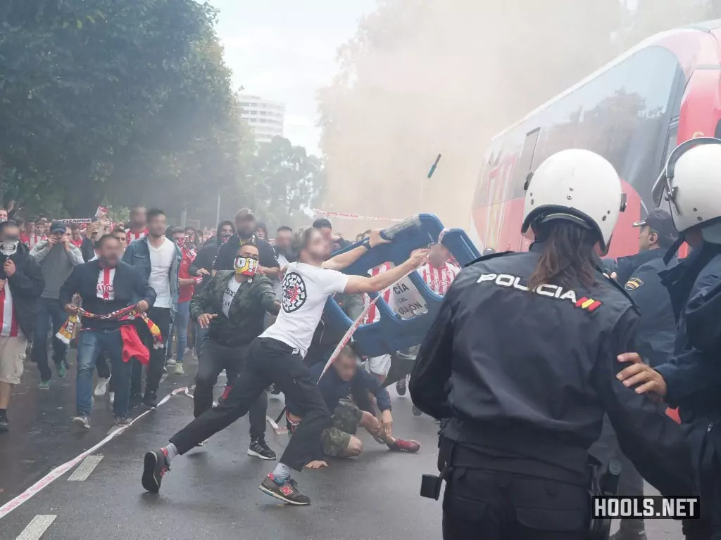 Sporting Gijon fans clash with police before their game against Real Oviedo
