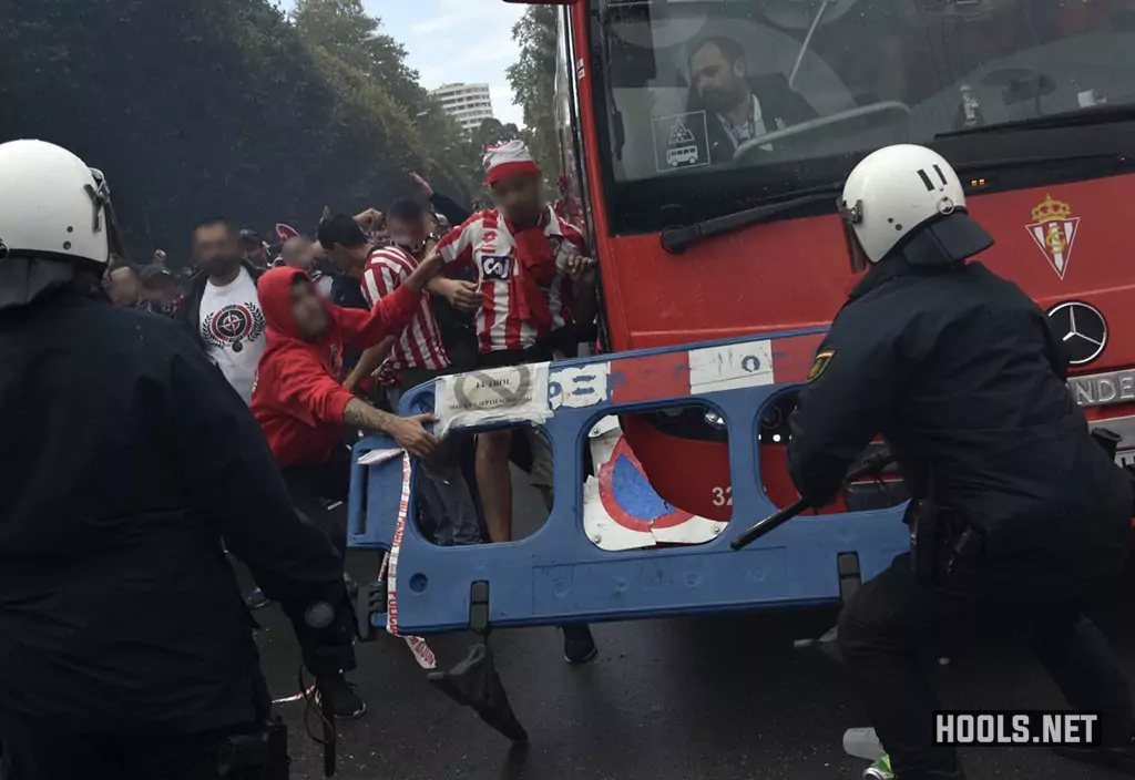 Sporting Gijon fans clash with police before their game against Real Oviedo