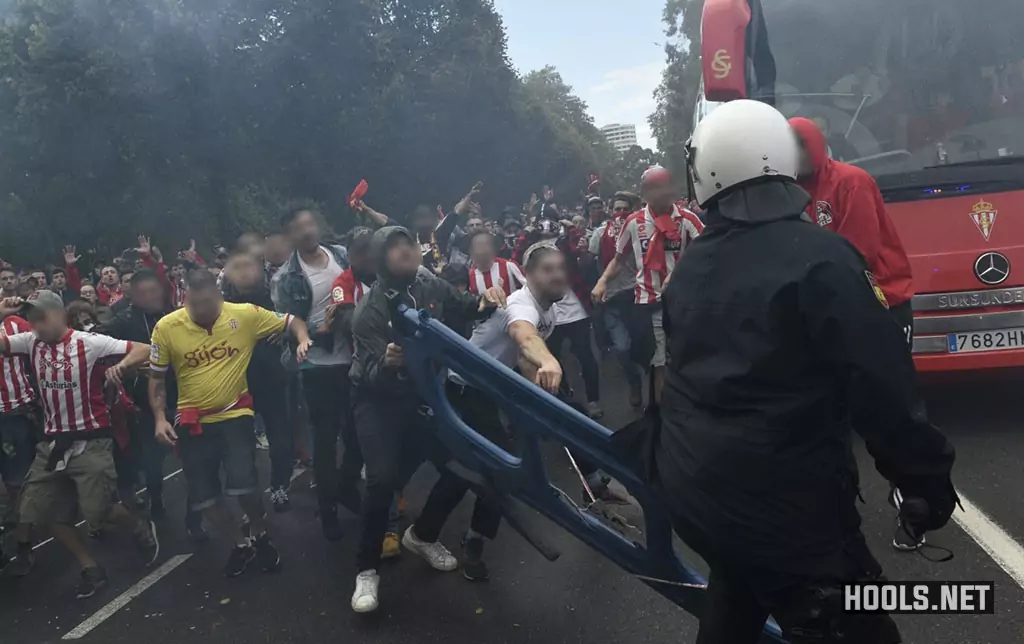 Sporting Gijon fans clash with police before their game against Real Oviedo