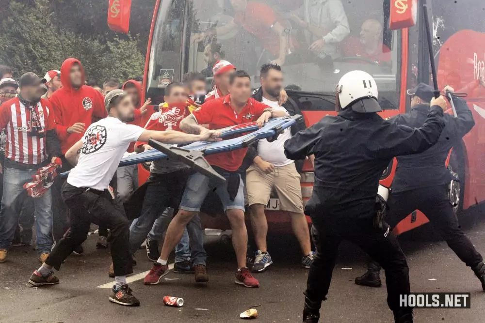 Sporting Gijon fans clash with police before their game against Real Oviedo