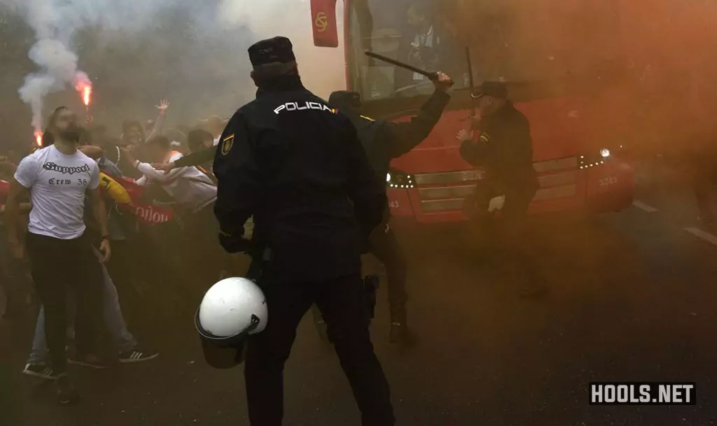 Sporting Gijon fans clash with police before their game against Real Oviedo