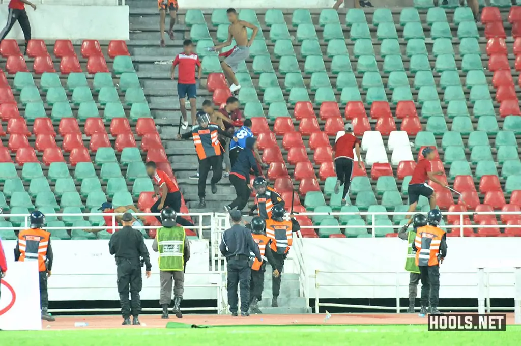 Wydad Casablanca fans clash with police in the stands at the Prince Moulay Abdellah Stadium in Rabat.