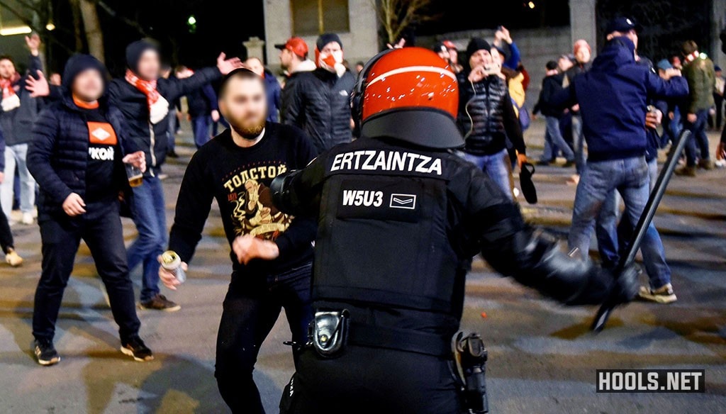A cop confronts a Spartak Moscow hooligan outside the San Mames stadium