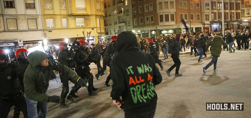 Riot police clash with supporters