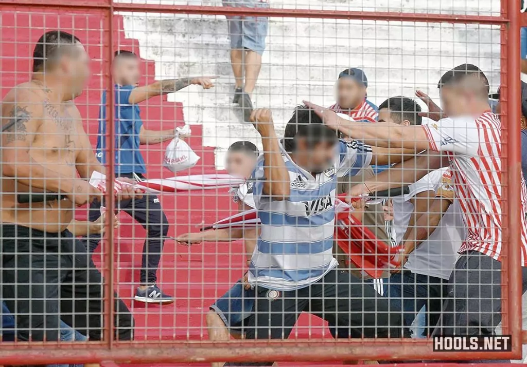 Los Andes fans fight amongst themselves during the side's match against Brown de Adrogue