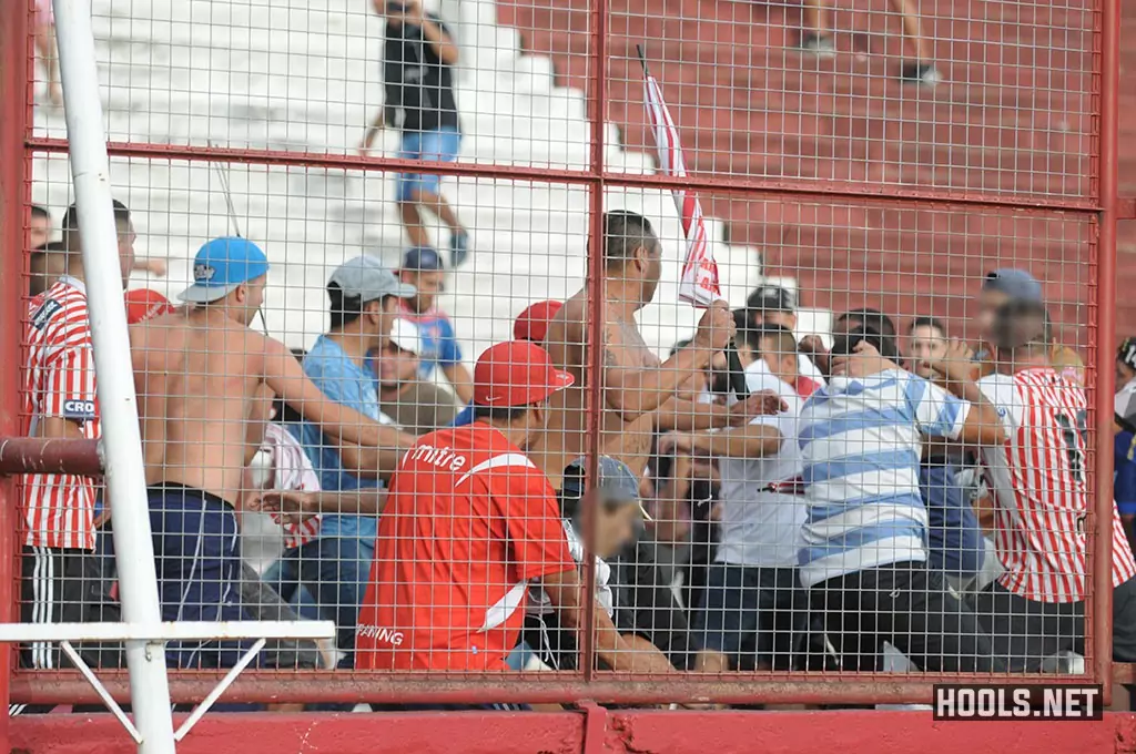 Los Andes fans fight amongst themselves during the side's match against Brown de Adrogue