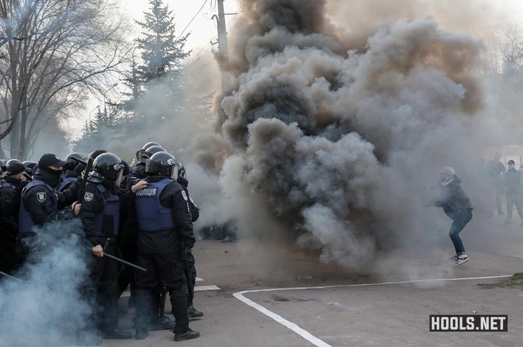 Dynamo Kyiv hooligans clash with police outside the Volodymyr Boiko Stadium.