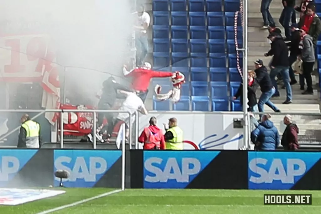 Borussia M'gladbach hoolihans steal a flag from Cologne ultras.