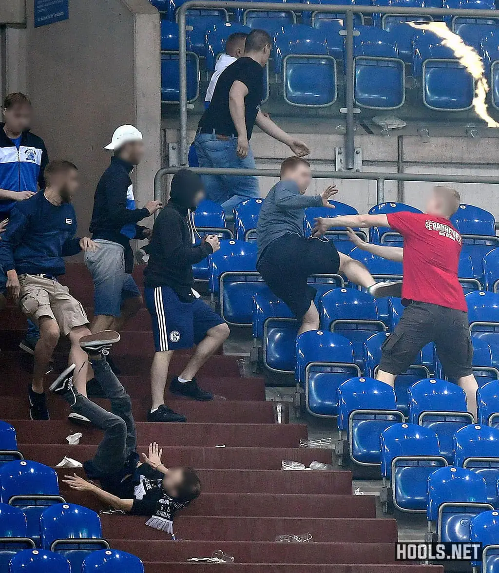 Schalke and Eintracht Frankfurt hools clash at the end of their DFB Pokal semi-final