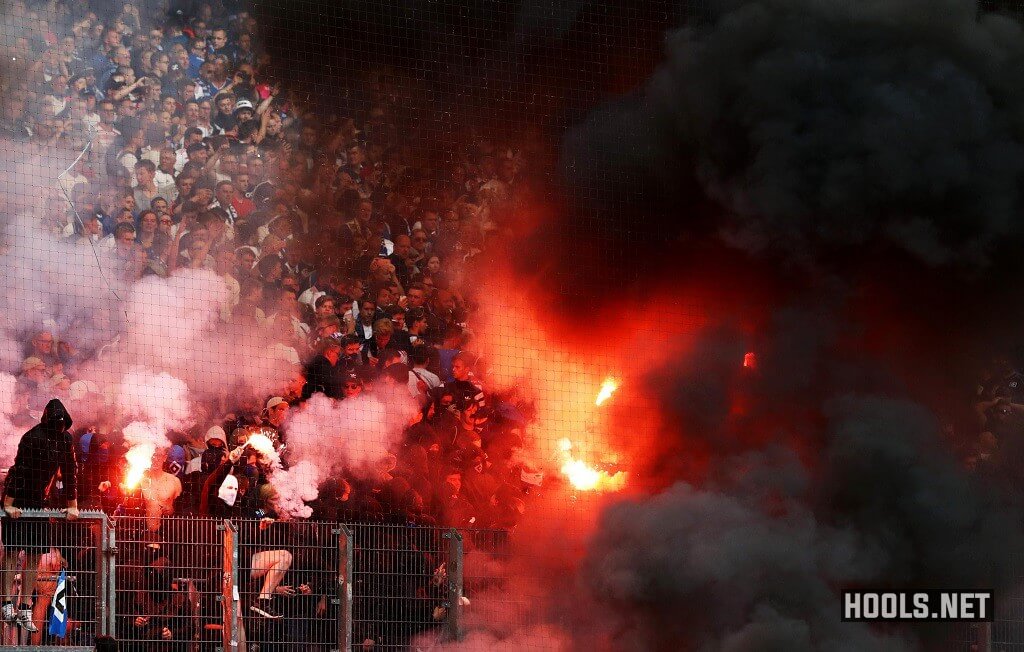 Hamburg fans light flares at the end of their Bundesliga match with Borussia Moenchengladbach