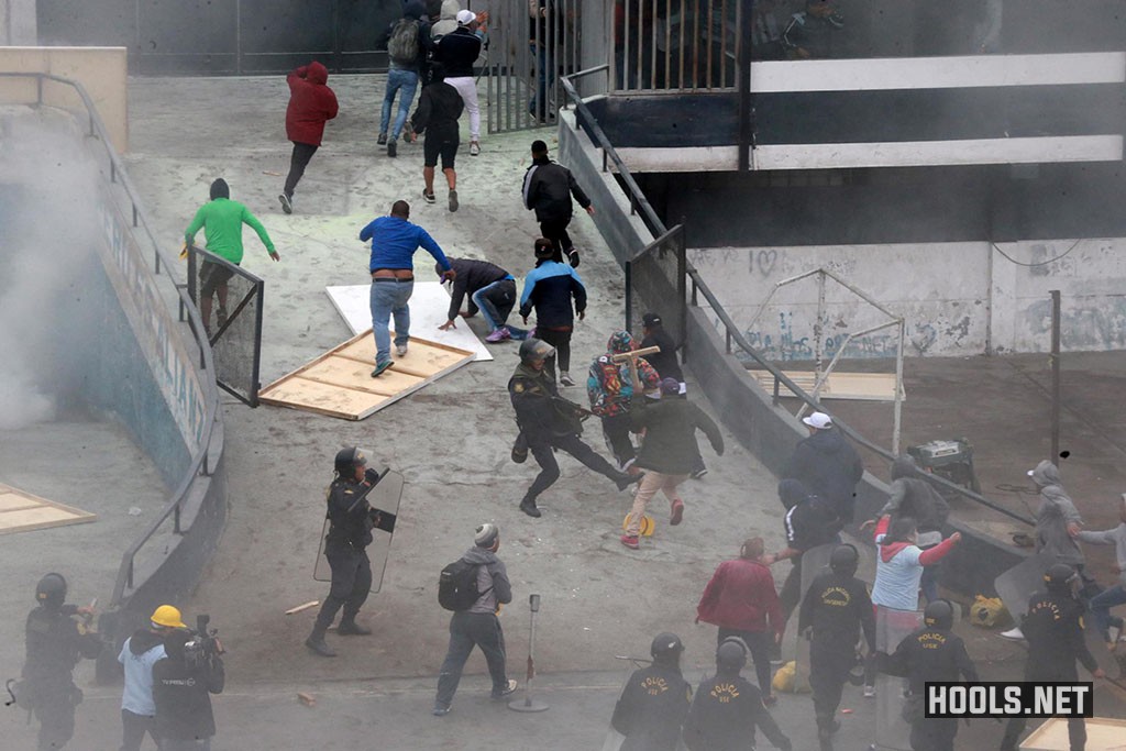 Peruvian police fire tear gas as Alianza Lima fans and evangelical Christians clash over a land dispute near the Alejandro Villanueva stadium.