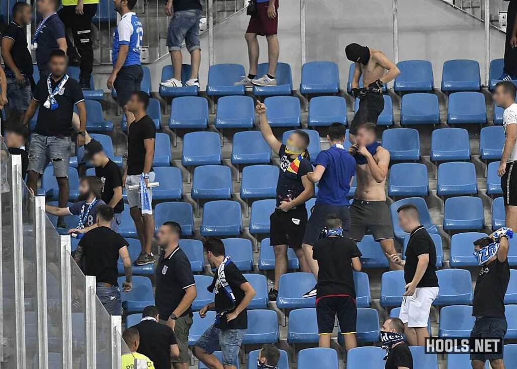 Universitatea Craiova fans goad Dinamo Bucharest fans during their Liga 1 match at the Ion Oblemenco Stadium.