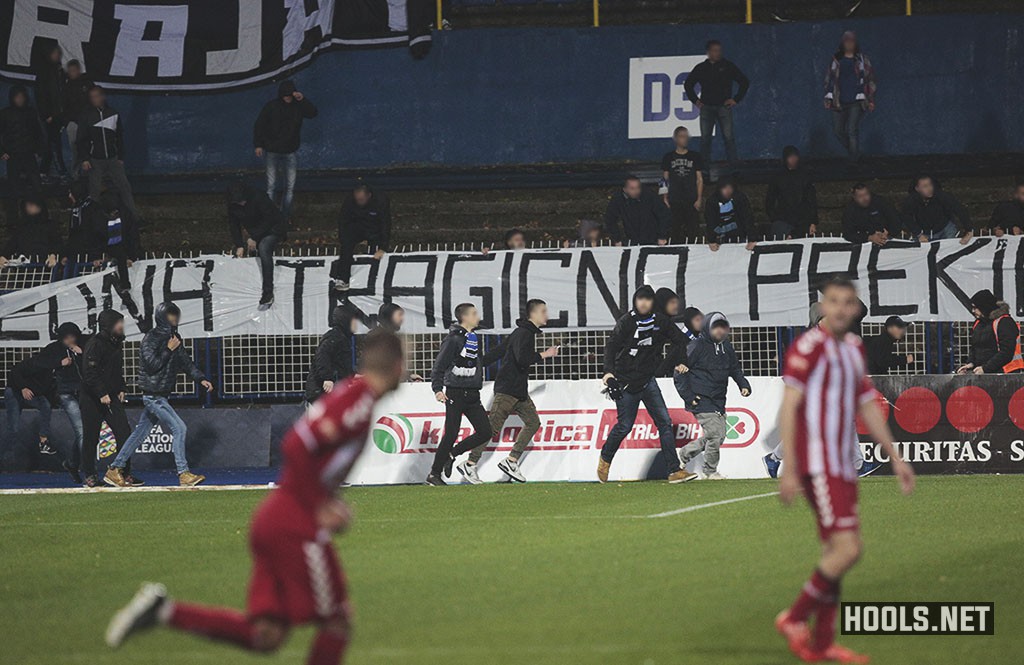 Zeljeznicar fans invade the pitch following their 1-0 home defeat to Zvijezda 09.