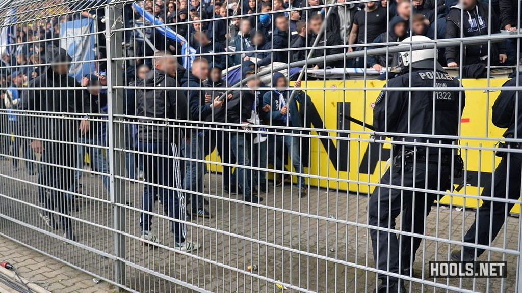 Hertha Berlin ultras clash with cops in the away end at the Westfalen Stadium during the side's Bundesliga match with Borussia Dortmund