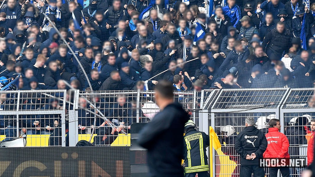 Hertha Berlin ultras clash with cops in the away end at the Westfalenstadion.