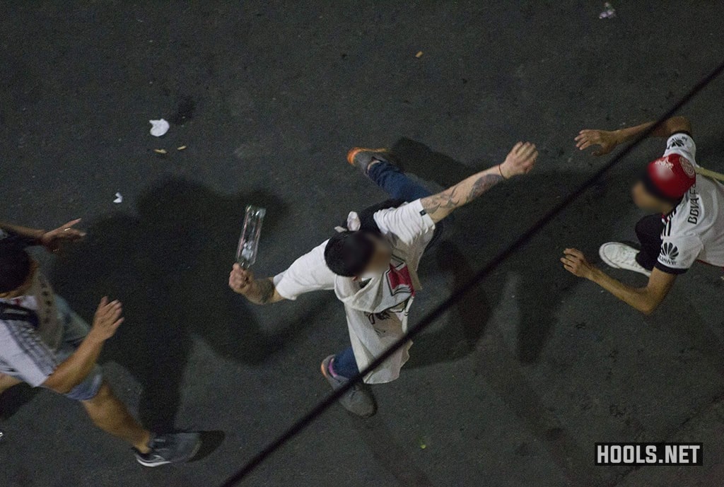 River Plate fans clash riot police in Buenos Aires