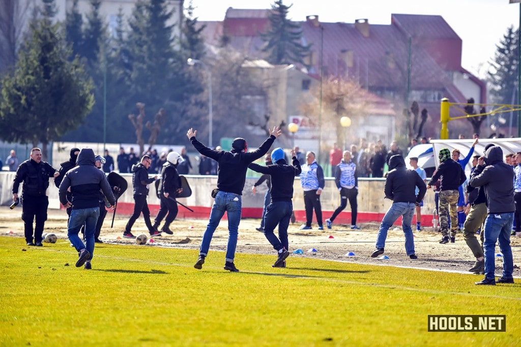 Karpaty Krosno fans invade the pitch during their match against JKS Jaroslaw.