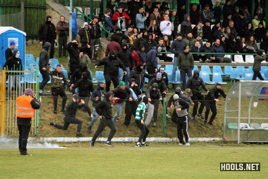 Okocimski Brzesko fans invade the pitch during their clash with Tarnovia Tarnow