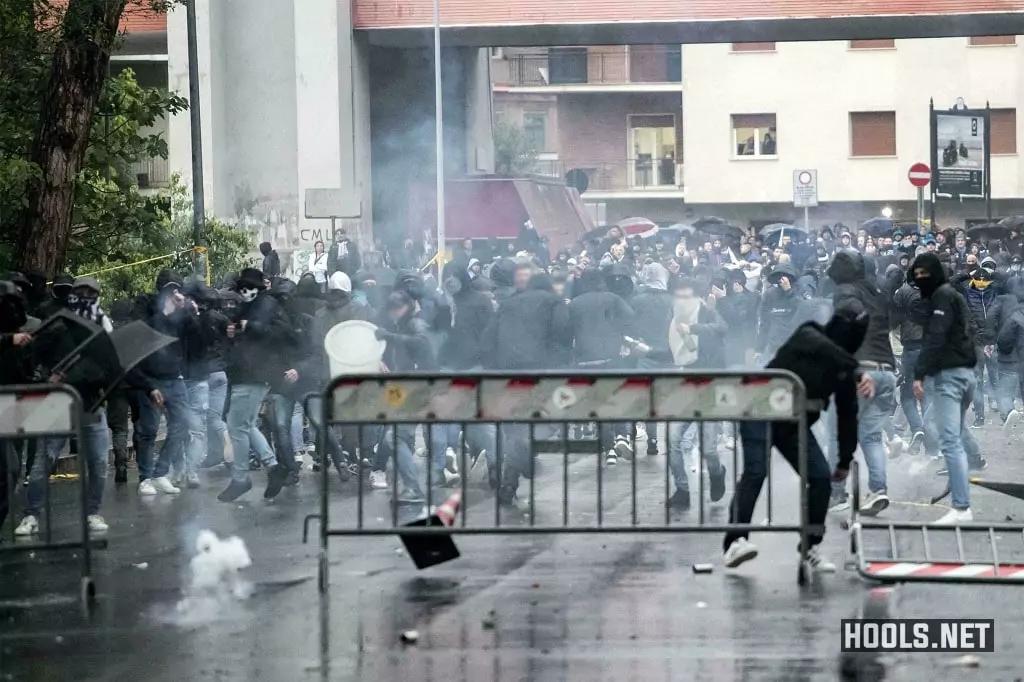 Lazio hooligans clash with riot police ahead of their Italian cup final against Atalanta.