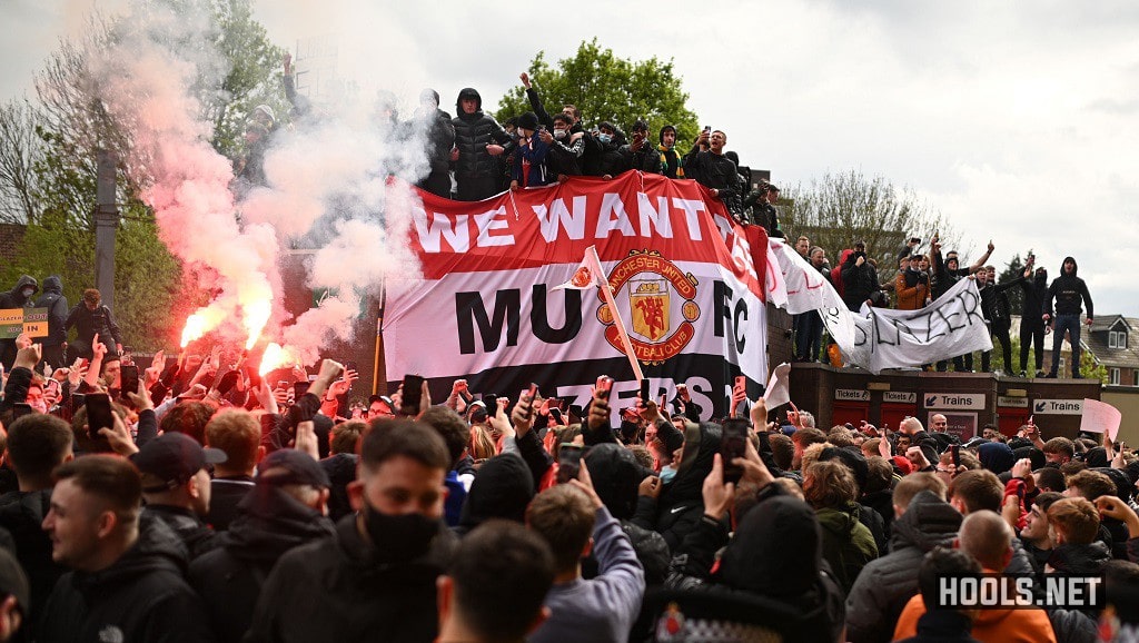 Manchester United fans protest against the team’s owners before their match with Liverpool.