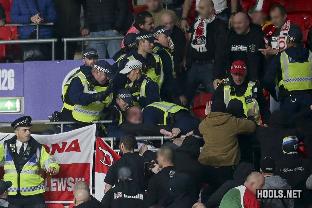 Hungary fans clash with police at Wembley during their side's World Cup 2022 qualifier against England.