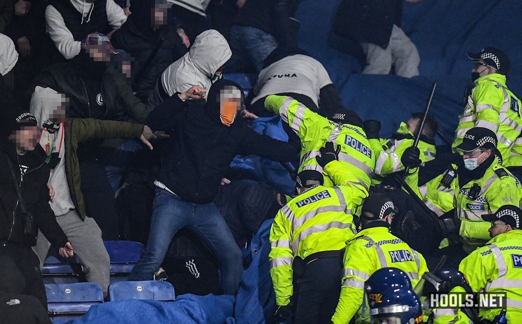 Legia fans clash with police at the King Power Stadium during their Europa League match against Leicester City.