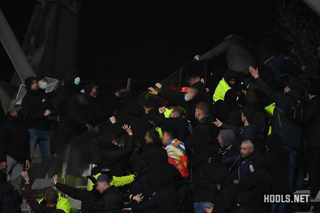 Paris FC and Lyon hooligans clash in the stands at half-time of their French Cup game.