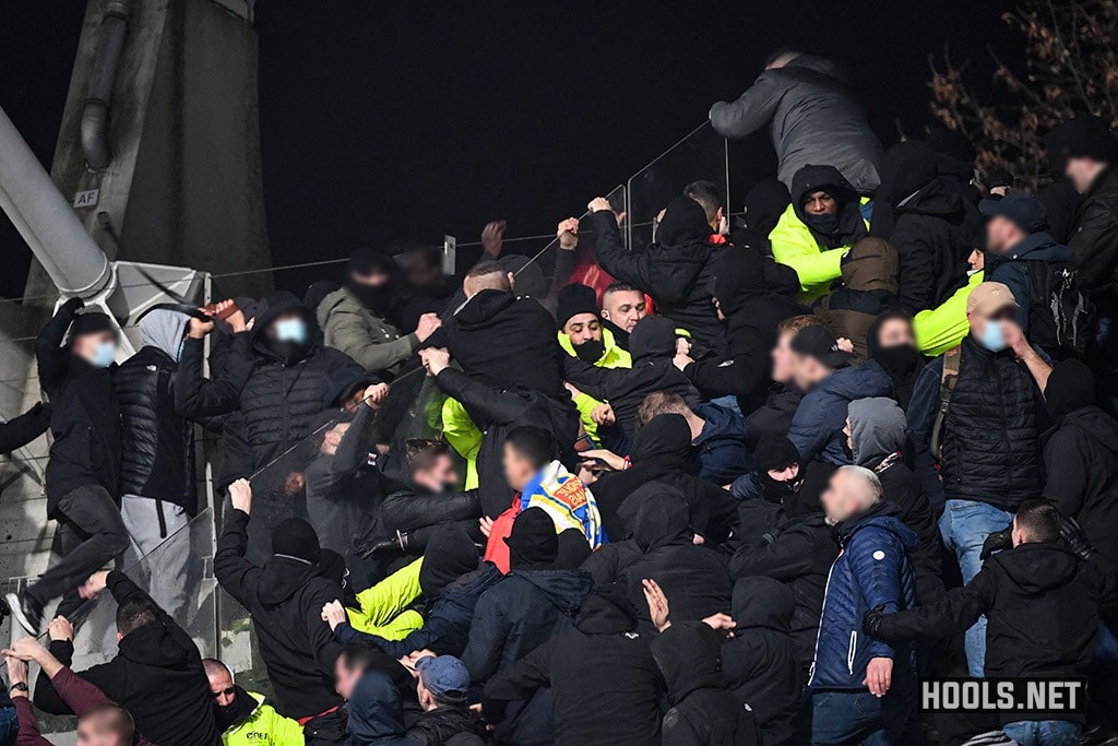 Paris FC and Lyon hooligans clash in the stands at half-time of their French Cup match.