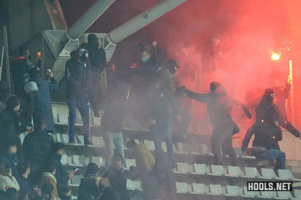 Paris FC and Lyon hooligans fight in the stands of the Charlety stadium at half-time of their French Cup tie.