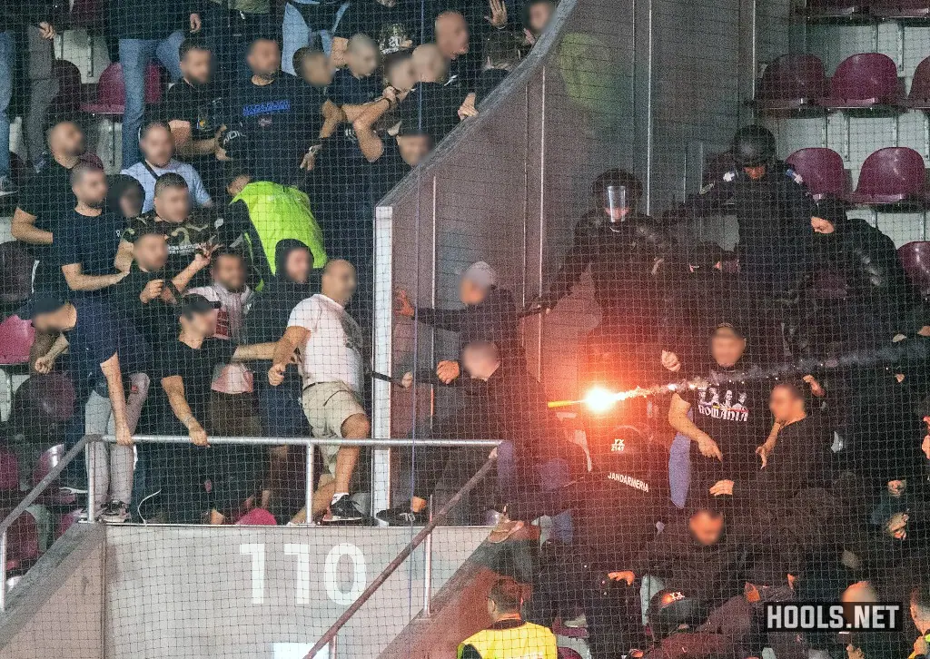 Romanian and Bosnian fans fight in the stands during their Nations League match at the Giulesti Stadium in Bucharest