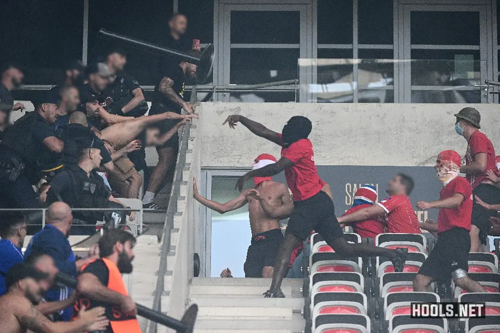 Nice and Cologne fans fight in the stands at the Allianz Riviera stadium before their Europa Conference League match