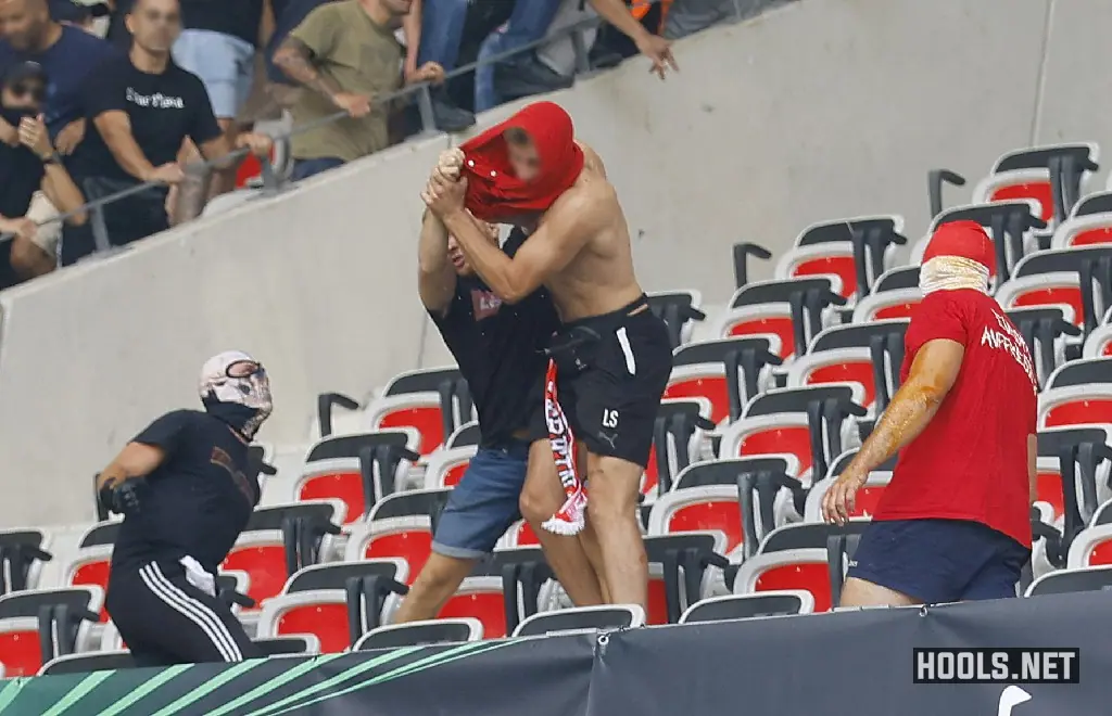 Nice and Cologne fans fight in the stands before their Europa Conference League match