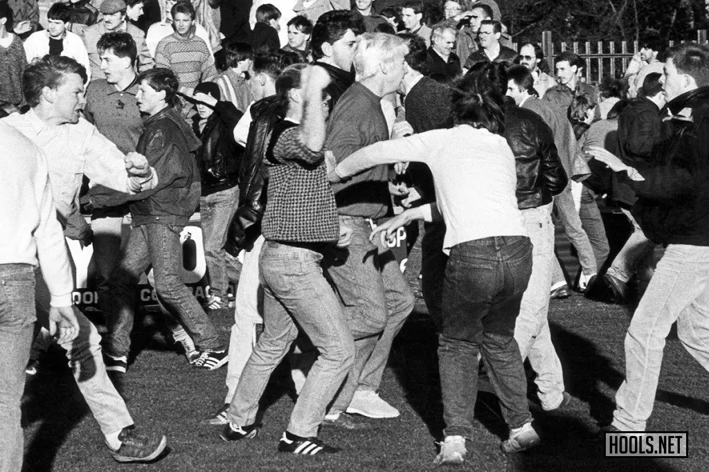 Darlington and Middlesbrough fans brawl on the pitch during a game on 8 November 1986