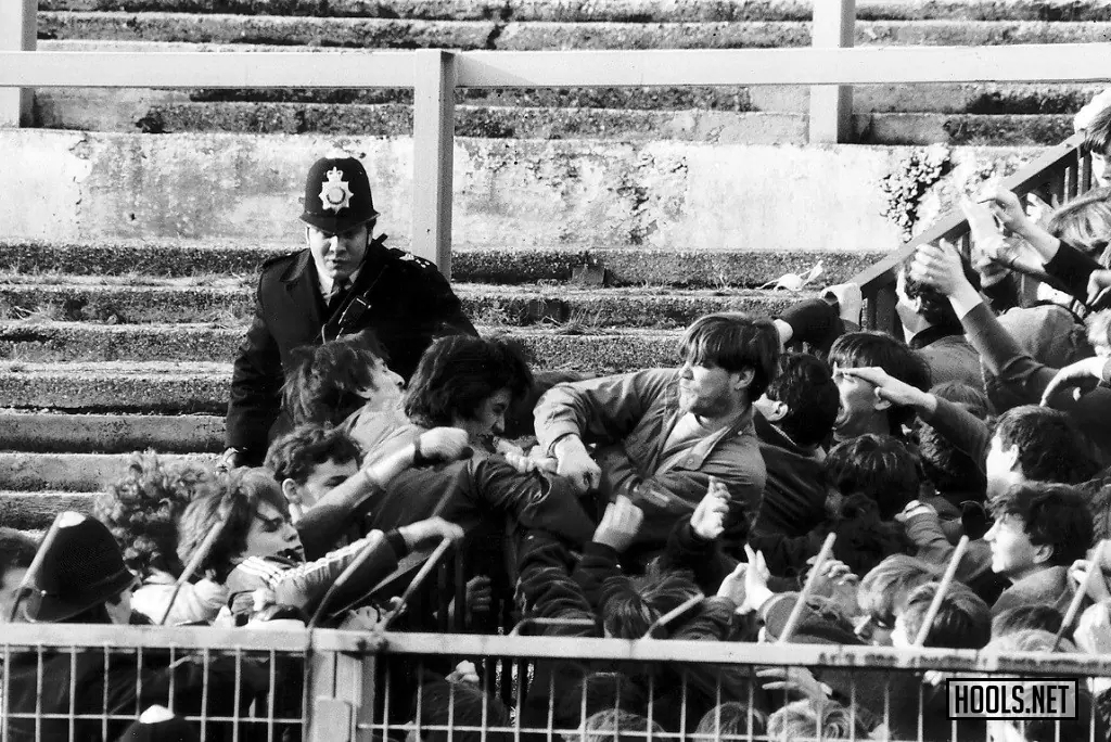 Chelsea and Liverpool hooligans fight on the terraces during an FA Cup tie at Stamford Bridge on 13 February 1982