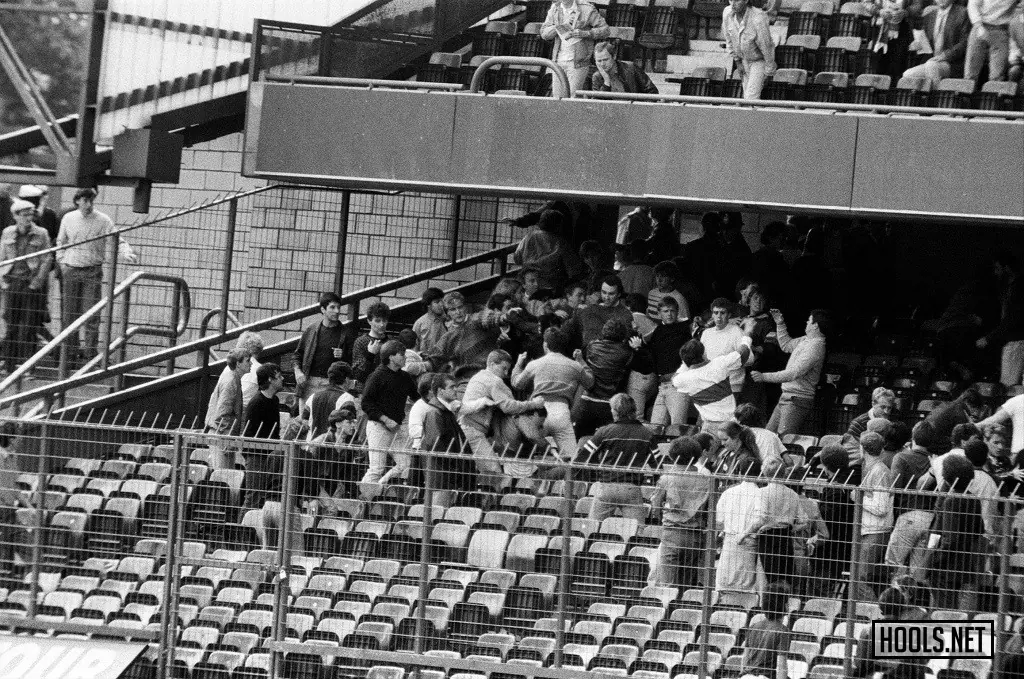 Chelsea and West Ham hooligans fight in the stands at Stamford Bridge during a match on 15 September 1984