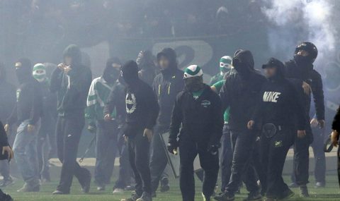 Panathinaikos hools clash with police after match called off