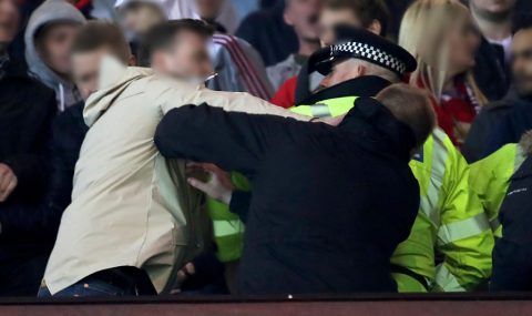 Man United and Liverpool fans scuffle during Europa League match