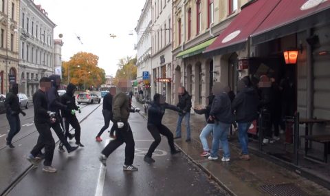 Goteborg and AIK hooligans clash outside Gothenburg pub